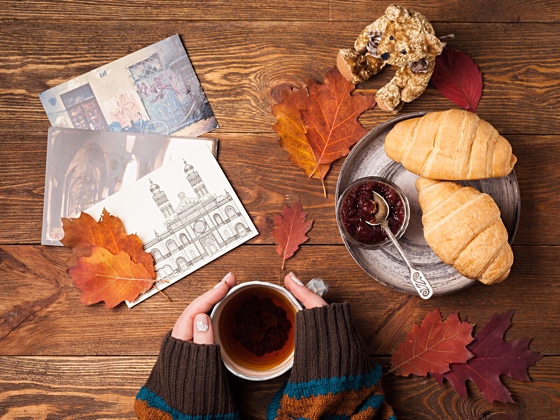 Breakfast table with croissants and jam